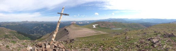 The cross sits atop Conejos Peak in Colorado, which I summitted this summer with my family.